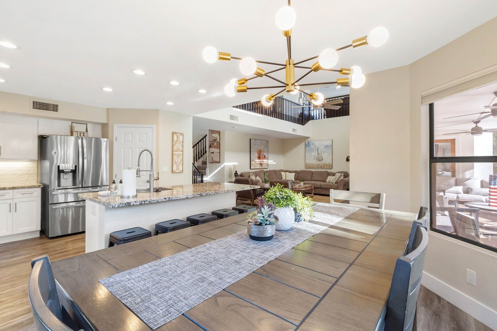 Open sightline from the dining area through the remodeled kitchen